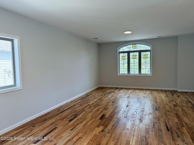 THIS SPACIOUS, DETACHED TWO-FAMILY *7 OVER 7*HOME LOCATED IN THE - photo 6