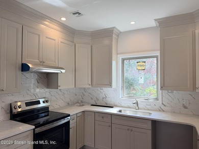 THIS SPACIOUS, DETACHED TWO-FAMILY *7 OVER 7*HOME LOCATED IN THE - photo 8