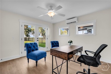 Perched on deep water along Richardson Creek, this reimagined - photo 40