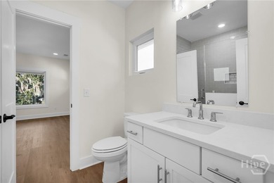 Perched on deep water along Richardson Creek, this reimagined - photo 45