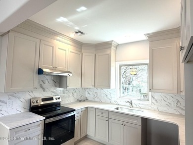 THIS SPACIOUS, DETACHED TWO-FAMILY '7 OVER 7'HOME LOCATED IN THE - photo 9