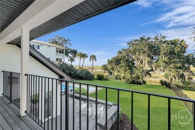 Perched on deep water along Richardson Creek, this reimagined - photo 50