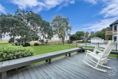 Perched on deep water along Richardson Creek, this reimagined - photo 53