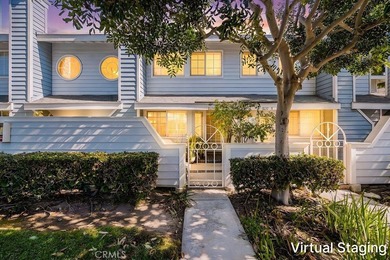 Located within the gated community of Seawind Cove, this - photo 1