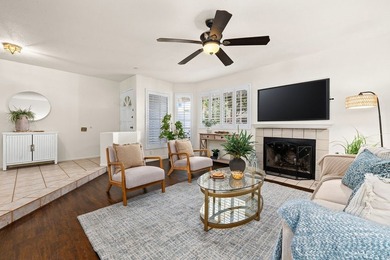 Located within the gated community of Seawind Cove, this - photo 3