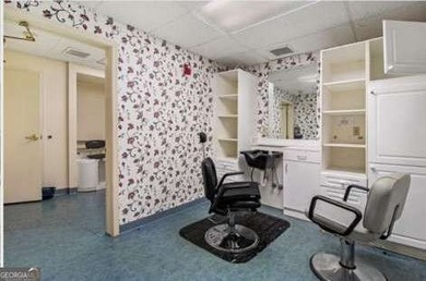 This spacious three-story assisted living facility at 5690 State