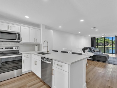 Lake Townhome/Townhouse For Sale in Coconut Creek, Florida
