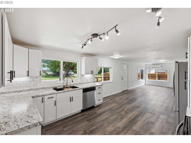 Discover coastal living at its best in this beautifully updated - photo 11
