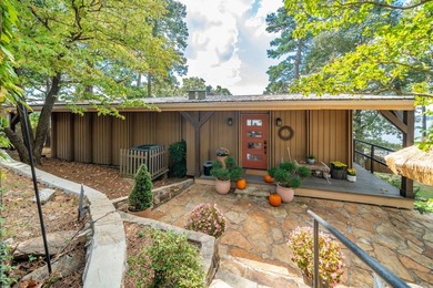 Step through the gated entry to a private, lakeside estate on - photo 2