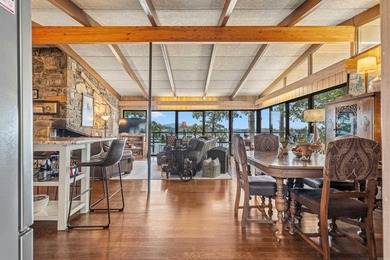 Step through the gated entry to a private, lakeside estate on - photo 3