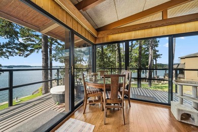 Step through the gated entry to a private, lakeside estate on - photo 6