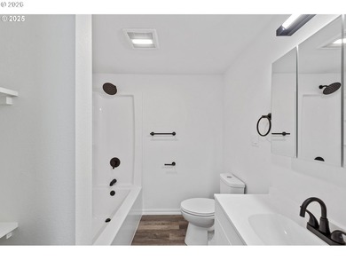Discover coastal living at its best in this beautifully updated - photo 18