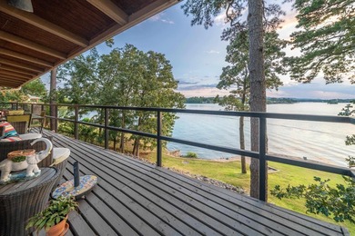 Step through the gated entry to a private, lakeside estate on - photo 10