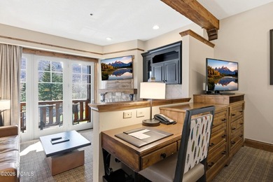 Perched on the top floor, this beautifully updated executive - photo 4