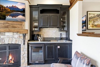 Perched on the top floor, this beautifully updated executive - photo 5
