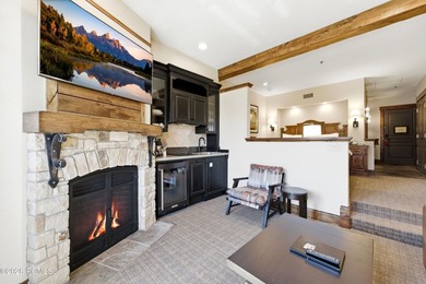 Perched on the top floor, this beautifully updated executive - photo 6