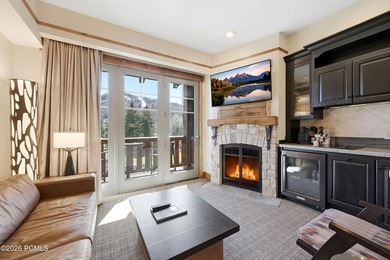 Perched on the top floor, this beautifully updated executive - photo 7