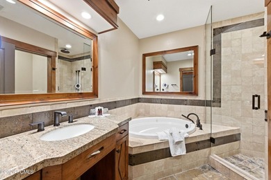 Perched on the top floor, this beautifully updated executive - photo 9
