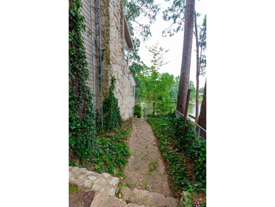 Step into timeless character and lakeside charm with this unique - photo 2