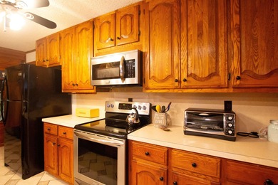 Step into timeless character and lakeside charm with this unique - photo 6