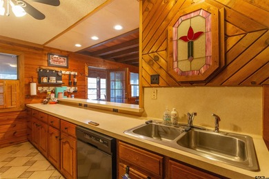 Step into timeless character and lakeside charm with this unique - photo 7