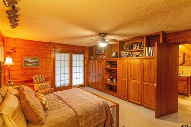 Step into timeless character and lakeside charm with this unique - photo 9