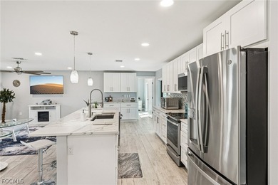 Stunning 3/2/2 waterfront pool home offering direct Gulf access - photo 14