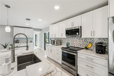 Stunning 3/2/2 waterfront pool home offering direct Gulf access - photo 15