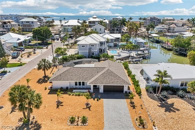 Stunning 3/2/2 waterfront pool home offering direct Gulf access - photo 38