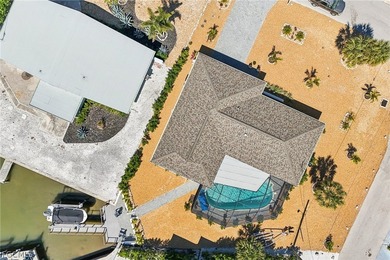 Stunning 3/2/2 waterfront pool home offering direct Gulf access - photo 42