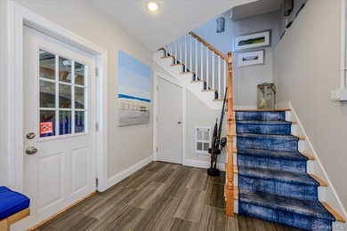 Welcome to this Pristine, Renovated, FEMA-Compliant Coastal - photo 4