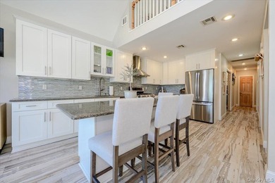 Welcome to this Pristine, Renovated, FEMA-Compliant Coastal - photo 6