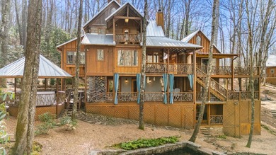A truly one-of-a-kind mountain sanctuary, this 9.86-acre retreat - photo 2