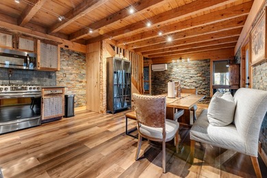 A truly one-of-a-kind mountain sanctuary, this 9.86-acre retreat - photo 10