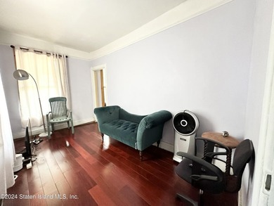 Welcome to this charming two-family detached home located in the - photo 7
