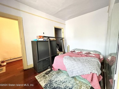 Welcome to this charming two-family detached home located in the - photo 9