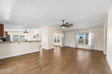 Enjoy breathtaking sunset views from this 2006-built ranch-style