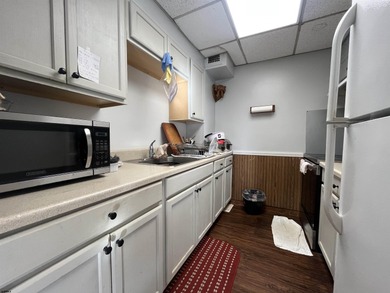 Welcome to Brighton Towers! This charming 2-bedroom, 1-bath