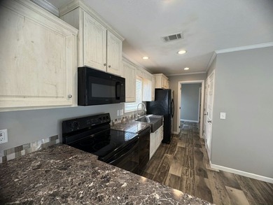 Tentatively available 7/1/2025. Welcome to Lighthouse Pointe, a - photo 7