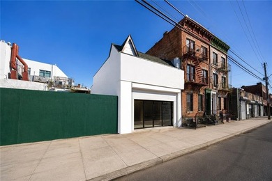 Introducing this solid all brick building at the high traffic - photo 3