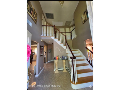 Welcome to this beautiful One Family 4 bedroom, 3 bath Center - photo 3
