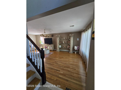 Welcome to this beautiful One Family 4 bedroom, 3 bath Center - photo 4