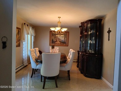 Welcome to this beautiful One Family 4 bedroom, 3 bath Center - photo 7