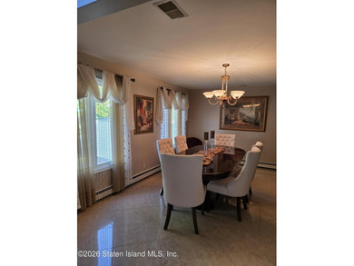 Welcome to this beautiful One Family 4 bedroom, 3 bath Center - photo 8