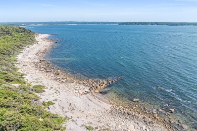 Set on 2.5 acres within the coveted Wings Neck community, this - photo 2