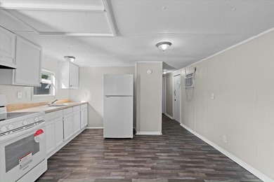 Own your own home in a quiet, well-maintained neighborhood with - photo 3