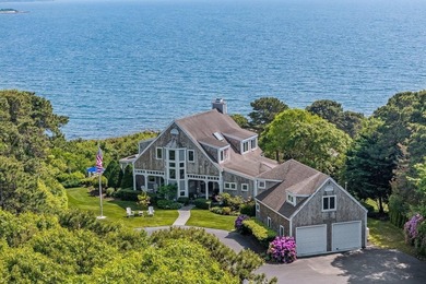 Set on 2.5 acres within the coveted Wings Neck community, this - photo 4