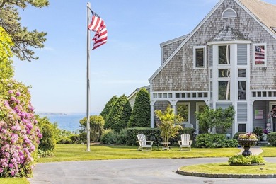 Set on 2.5 acres within the coveted Wings Neck community, this - photo 6