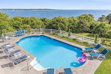 Set on 2.5 acres within the coveted Wings Neck community, this - photo 8