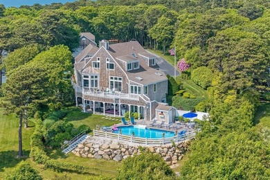 Set on 2.5 acres within the coveted Wings Neck community, this - photo 9